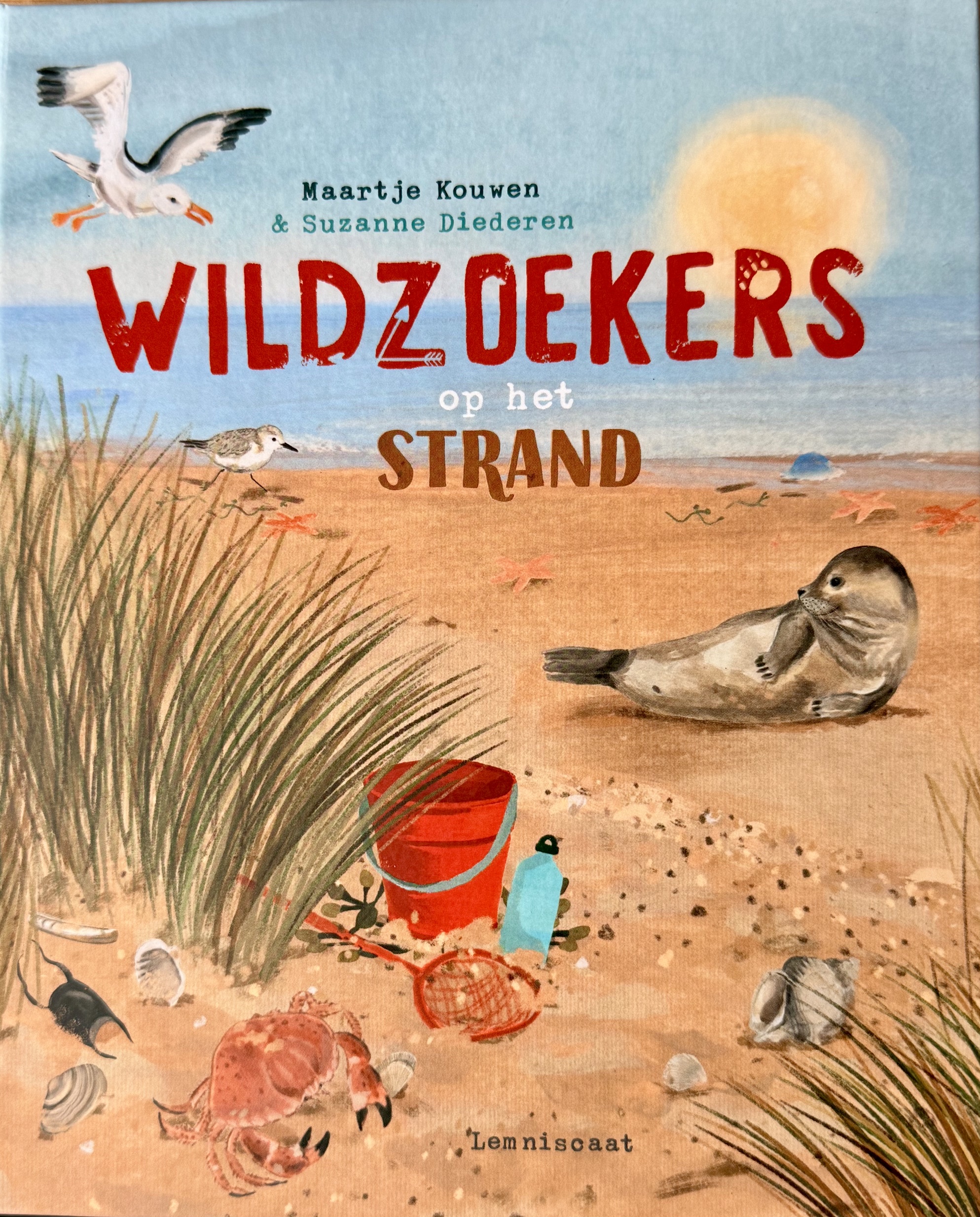 Wildzoekers op het strand